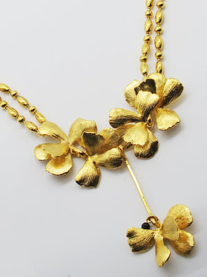 
                  
                    Flora gold beads necklace
                  
                