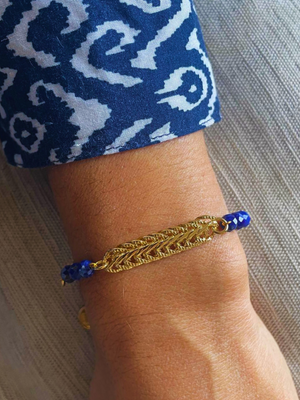 
                  
                    Braided Gold Lapis Lazuli Blue Bracelet
                  
                