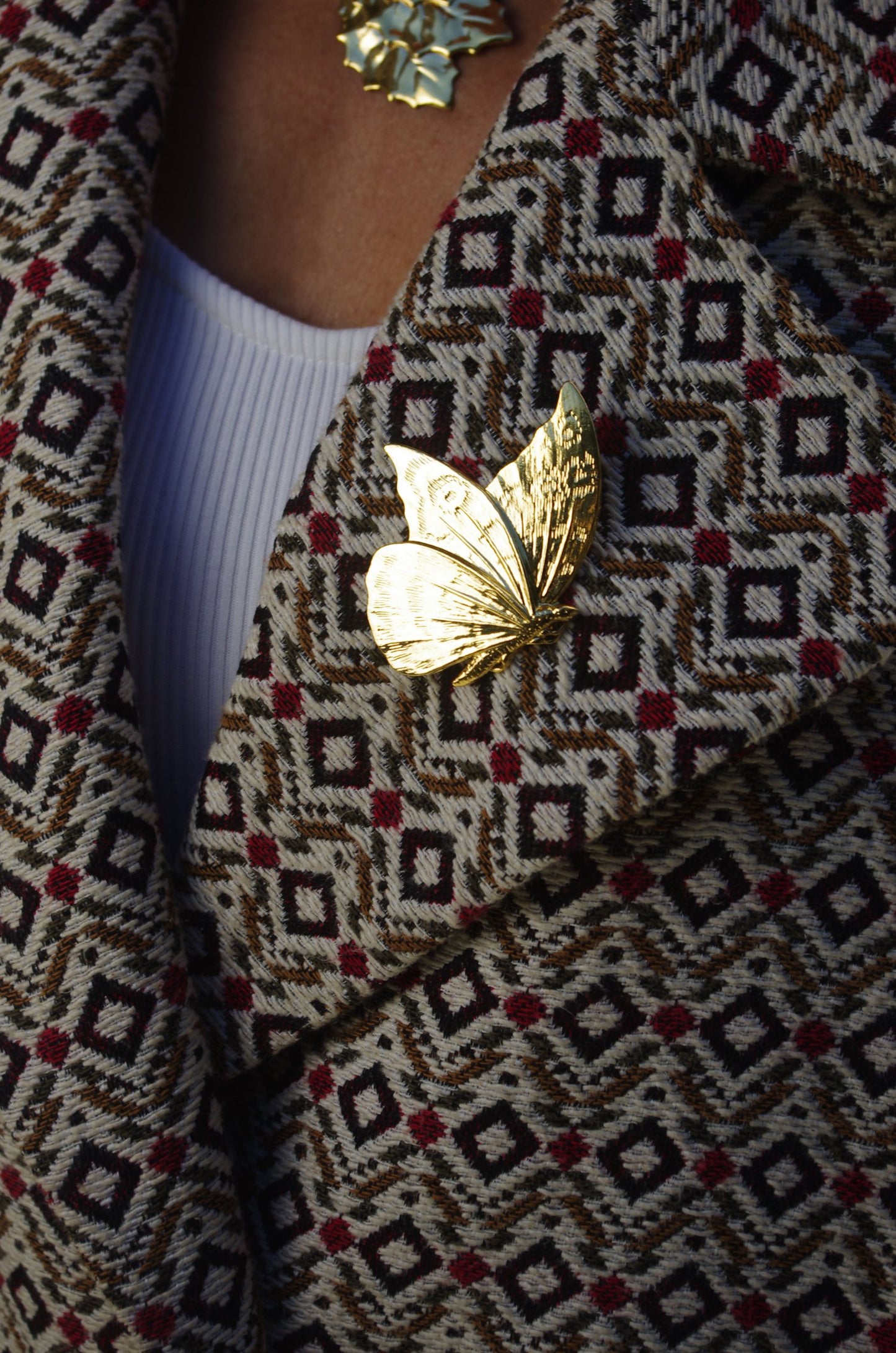 Gold butterfly brooch