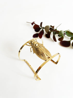 
                  
                    Gold-plated Cicada cuff
                  
                