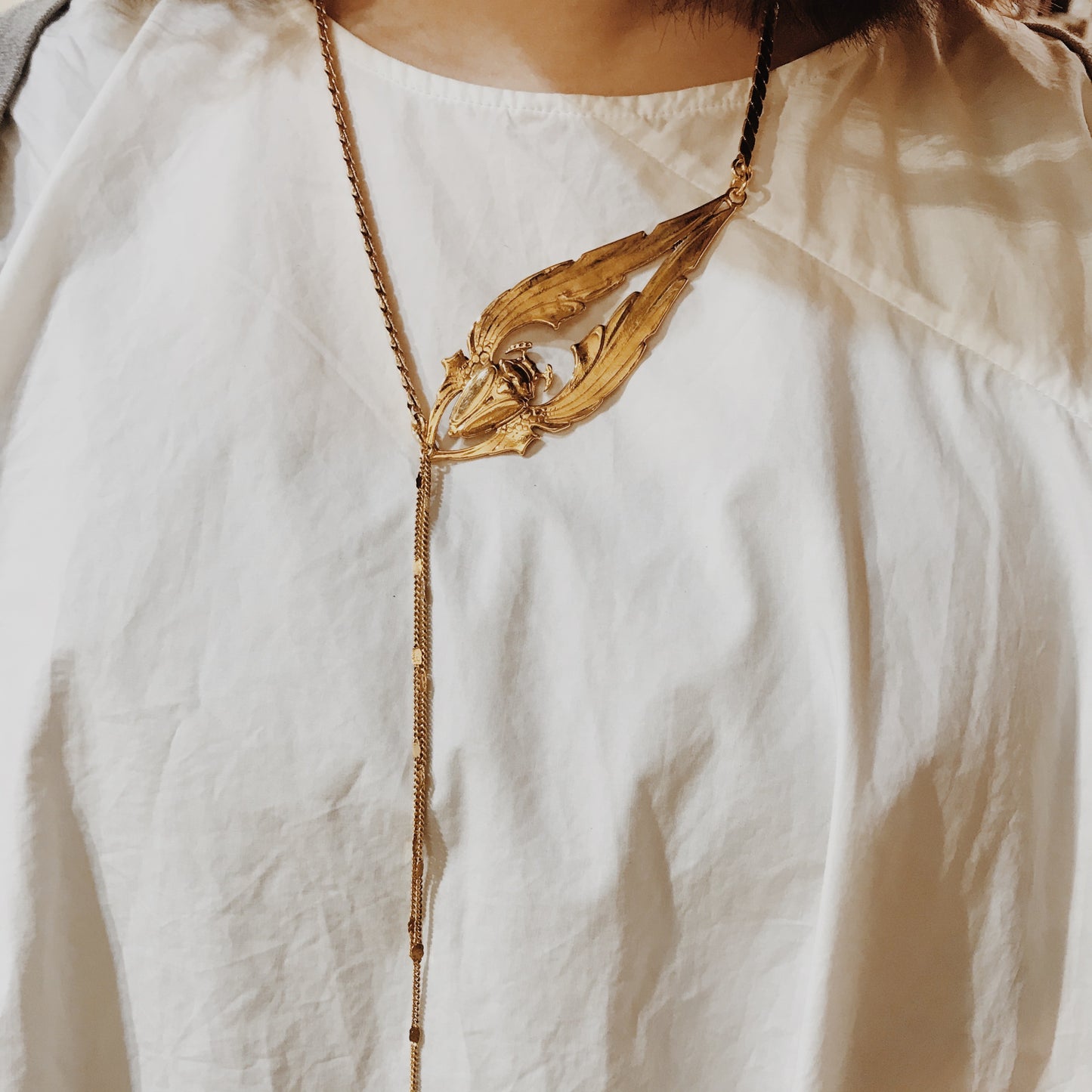 Long golden beetle necklace