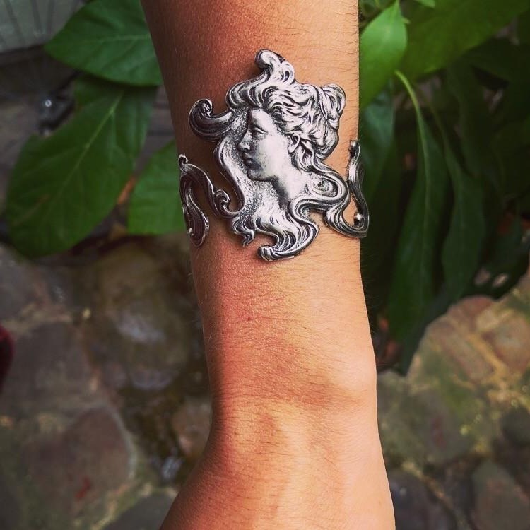 Silver-plated cuff bracelet worn on a woman's head vintage style art nouveau style
