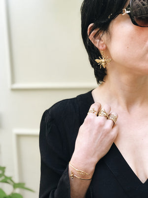 
                  
                    GOLDEN INSECT EARRINGS
                  
                