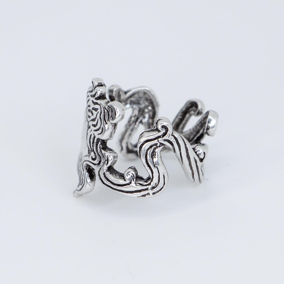 Side view of a Baroque Art Nouveau style silver ring with portrait of a woman