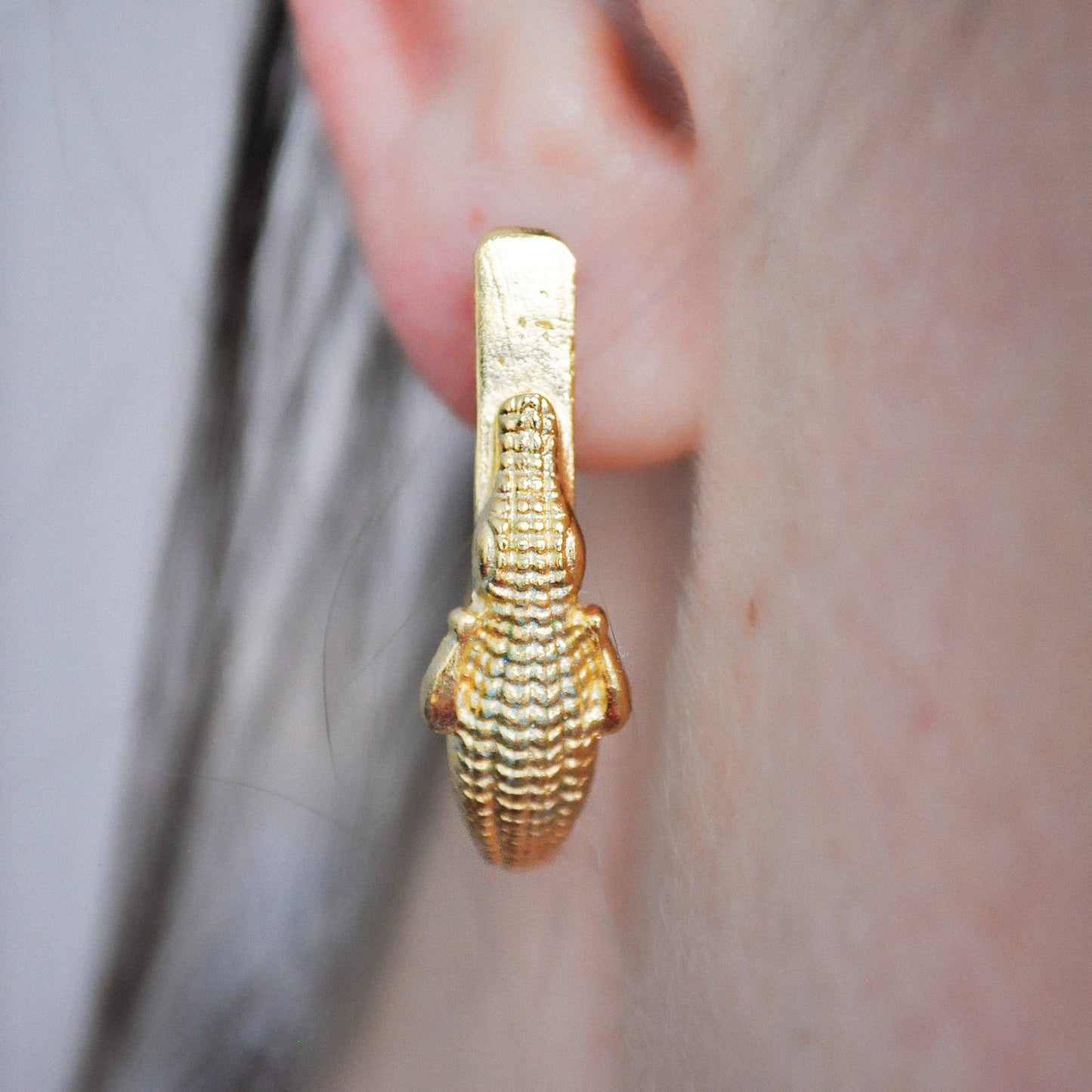Gold crocodile earrings
