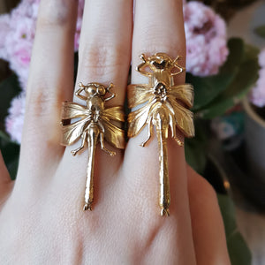 
                  
                    Two gold dragonfly rings
                  
                