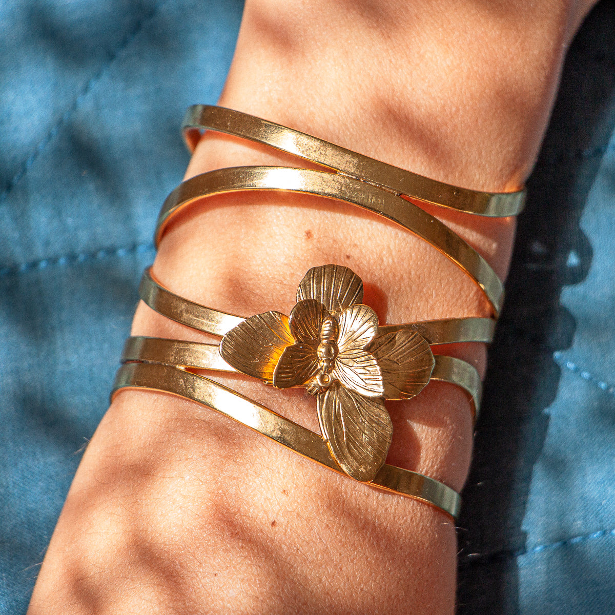wrist with gold ribbon butterfly bracelet