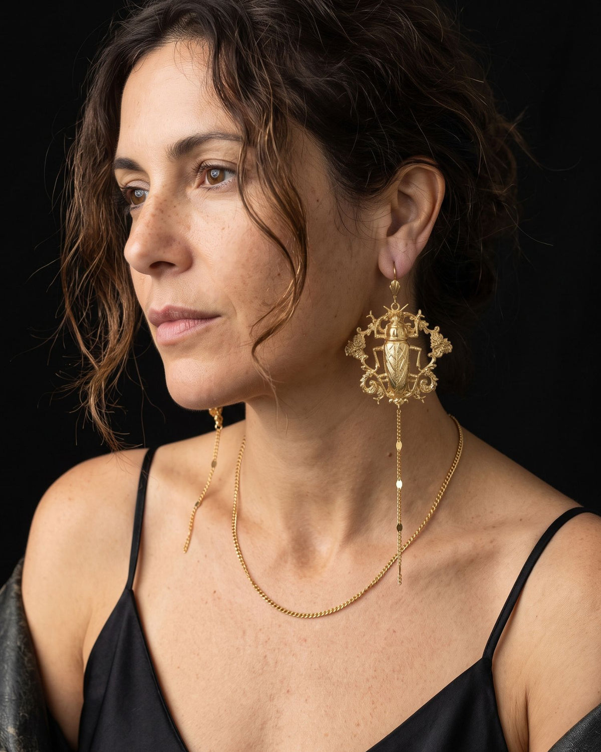 Boucles d'oreilles Maa — Doré