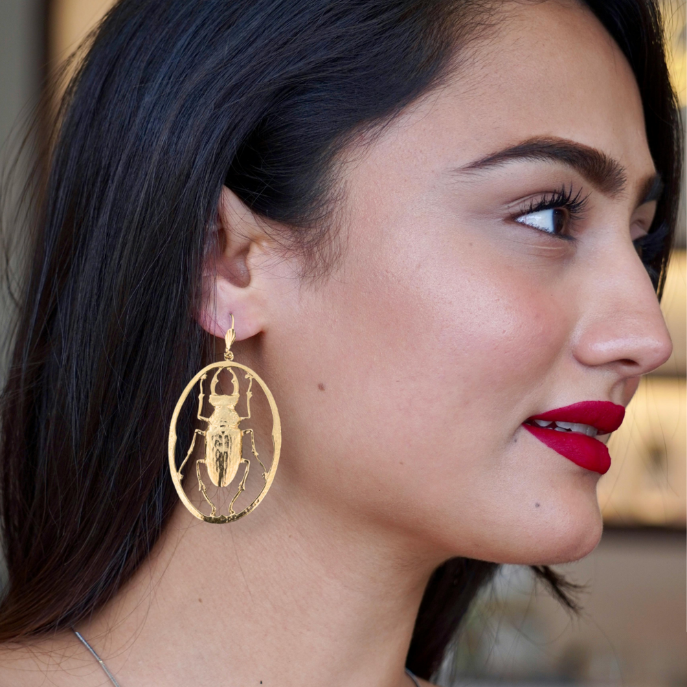 
                  
                    Boucles d'oreilles Scarabee Maddie dorées
                  
                