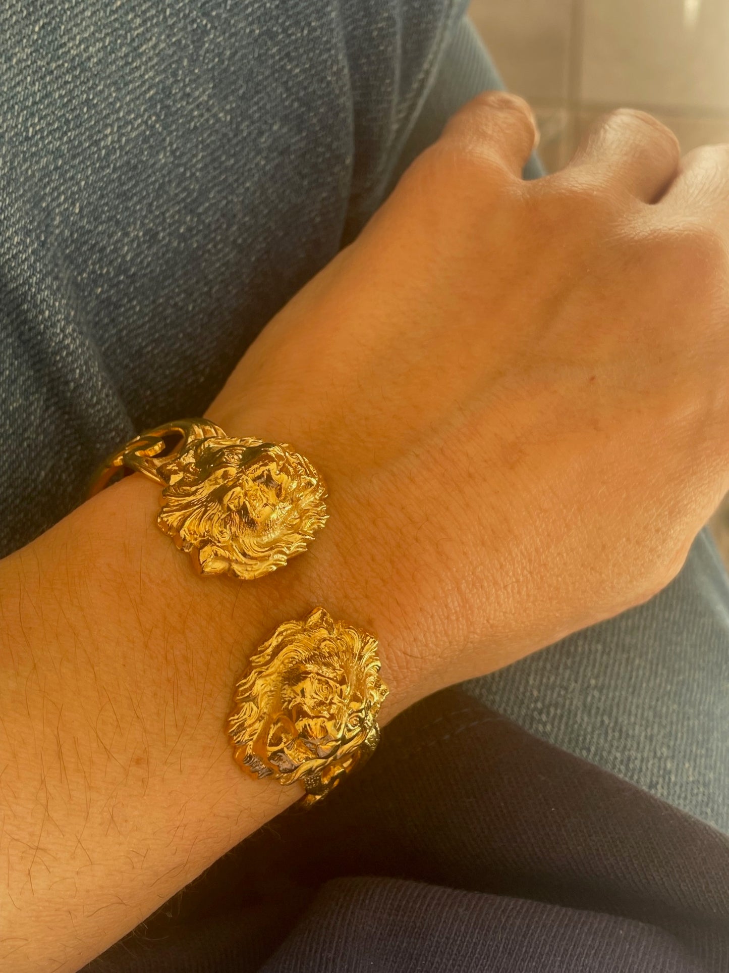 Bracelet double tête de lion doré