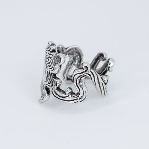 
                  
                    Side view of a Baroque Art Nouveau style silver ring with portrait of a woman
                  
                
