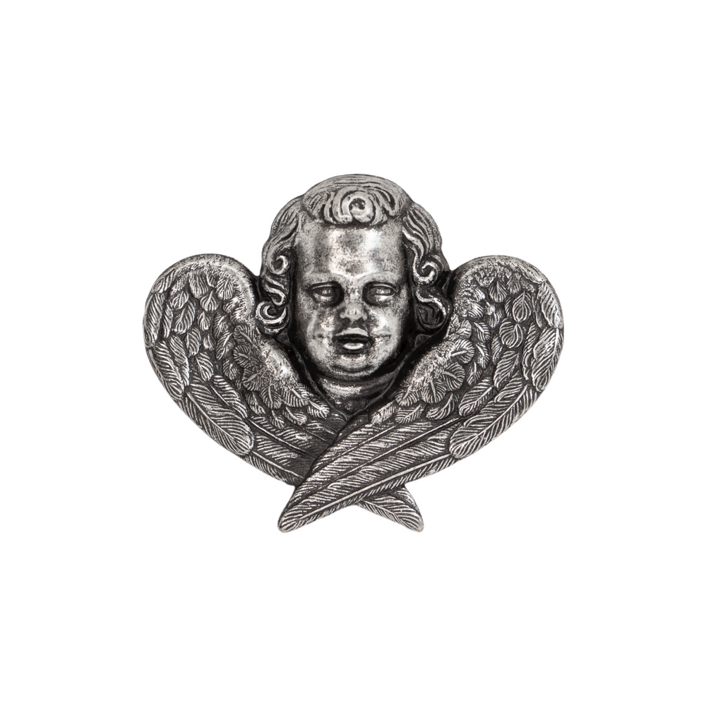 Silver cherub motif ring from Lotta Djossou 