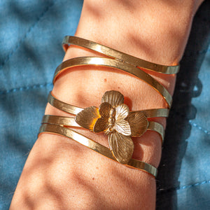 
                  
                    wrist with gold ribbon butterfly bracelet
                  
                